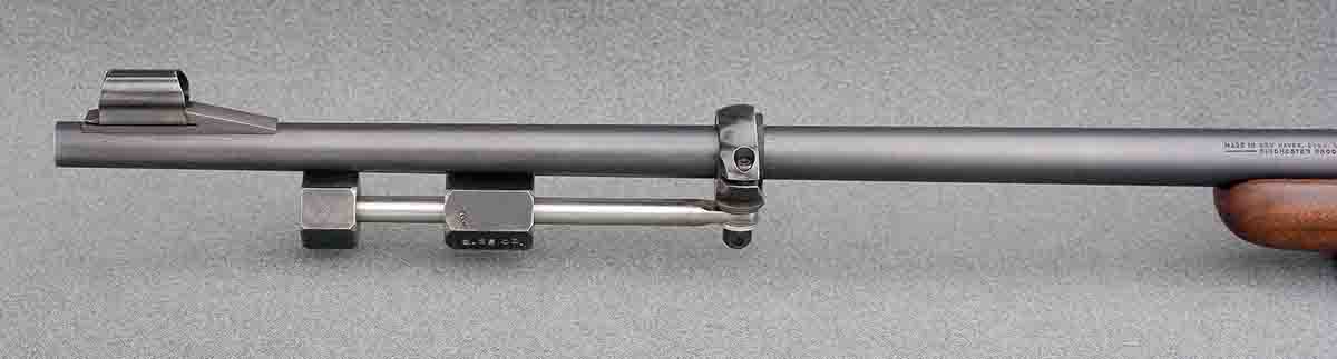 The barrel motion compensator (BMC) features adjustable, suspended weights. Various positions of the unit on the barrel and/or the sliding weights have a controlling effect on the barrel’s harmonic vibrations.
